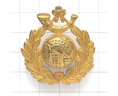 Royal Marine Light Infantry pre 1923 Sergeant’s cap badge. Die-stamped gilt Globe and laurel surmounted by strung bugle.   Lo