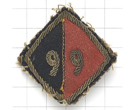 99th Light Anti-Aircraft Regt RA WW2 cloth formation sign. A very scarce locally made example. Bullion “99” on half navy / ha