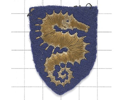 27th Armoured Brigade embroidered cloth formation sign.   Brown seahorse on blue felt shield.   Removed from uniform. GC Land