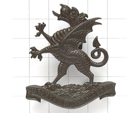 Welsh. 3rd Bn. Monmouthshire Regiment post 1908 OSD bronze cap badge.  Fine die-cast rampant Welsh Dragon on title scroll. Fi