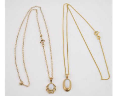 A pair of 9ct gold necklaces with opal set pendants, 3.9 grams (2).  