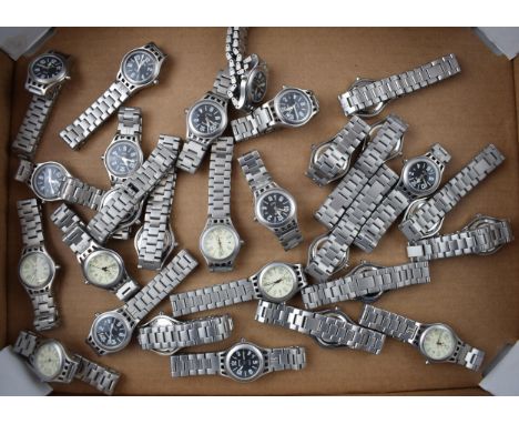 A large quantity of NOS Reunion by Rotary ladies watches. Quartz date movements. On metal bracelets. mostly with black dials.