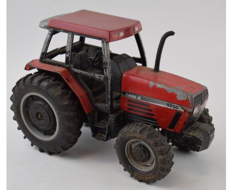 1/16th scale Eric 1989 tractor model of a Case Maxxum 5250, playworn condition.  