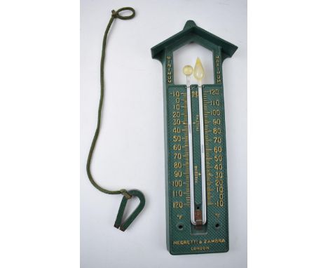 Negretti and Zambra barometer in metal frame, suitable for a greenhouse, 29cm tall, with original magnet.  In good condition 