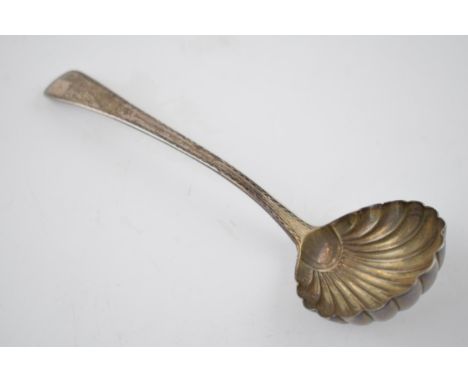A Georgian silver shell shaped ladle hallmarked London 1818. Length 17cm. Weight  45.1 grams.  In good original condition. Mo