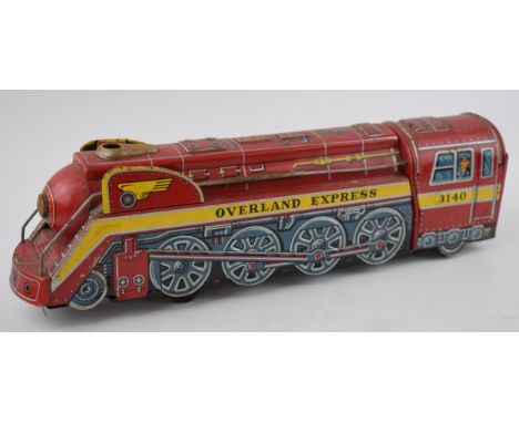 Overland Express vintage tin train engine locomotive. Made in Japan by Modern Toys. Length  42cm  In play worn condition.