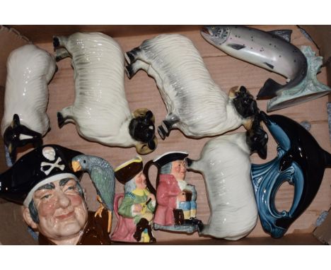 Pottery to include a large Royal Doulton character jug, a Poole dolphin, an Aynsley salmon, Coopercraft sheep and others (Qty
