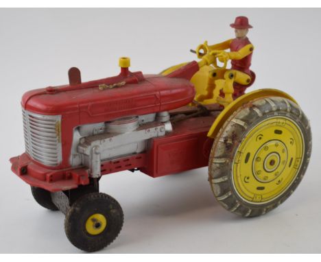 Vintage Louis Marx Farm Tractor and driver. Plastic &amp; Tin Toy. 17cm x 25cm.  In play worn condition.