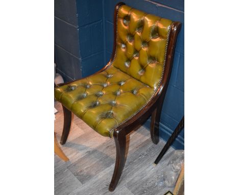 Vintage chesterfield button back single chair in green leather. Height 86cm, width 54cm, height of seat 49cm,  In good origin