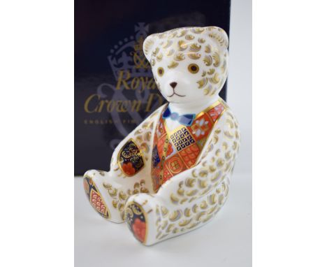 Royal Crown Derby paperweight, Teddy Bear with blue bow tie, 12cm, gold stopper and red Royal Crown Derby stamp on the base, 