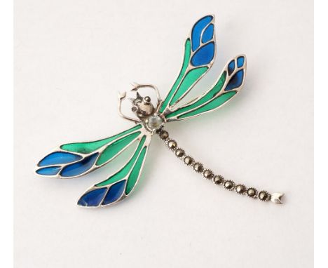 SILVER, MARCASITE, GEM AND ENAMEL DECORATED BROOCH
formed as a dragonfly with wings divided into colourful sections