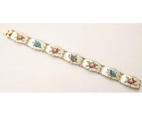 NORWEGIAN SILVER AND ENAMEL BRACELET BY IVAR T HOLTH
each of the seven enamel panels with floral decoration, approximately 19