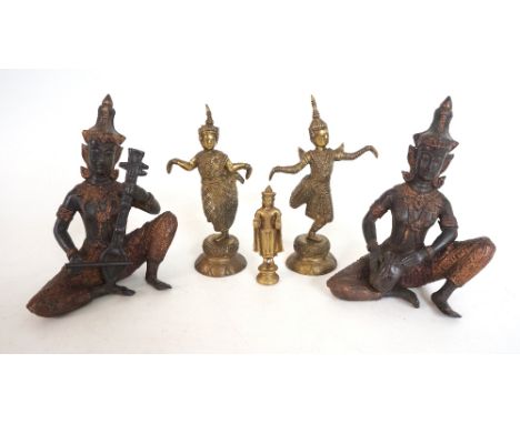 PAIR OF SRI LANKAN BRONZED FIGURES OF MUSICIANS
sat playing instruments, together with two brass Sri Lankan dancers in tradit