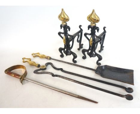 SET OF ART DECO FIRE TOOLS
comprising a pair of andirons, shovel and a pair of tongs, all with shaped brass finials, and a fi