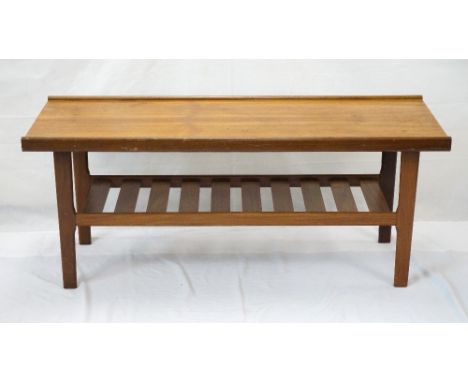 RETRO TEAK OCCASIONAL TABLE
with an oblong top above a slatted shelf, standing on shaped supports, 121cm wide 