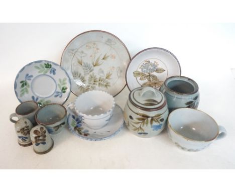 HIGHLAND STONEWARE TEA SERVICE
comprising in part two large cups and saucers, lidded jar and other, salt and pepper, sugar bo