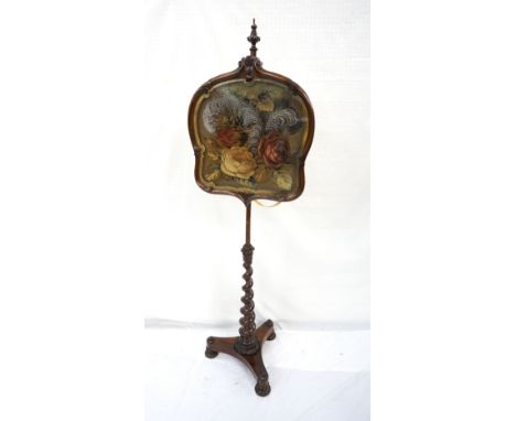 VICTORIAN ROSEWOOD POLE SCREEN
with an adjustable shaped screen with a needlework floral petit point tapestry, the pole termi