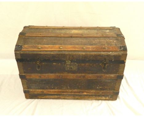 DOMED TOP TRUNK
with wood banding and metal side carrying handles, 77cm wide 
