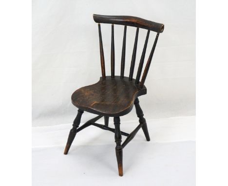 CHILD'S STICK BACK WINDSOR TYPE CHAIR
with a shaped top rail above six turned spindles, with a shaped seat standing on turned