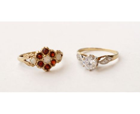 OPAL AND GARNET CLUSTER RING
on nine carat gold shank; and a CZ solitaire ring also on nine carat gold shank, both ring size 