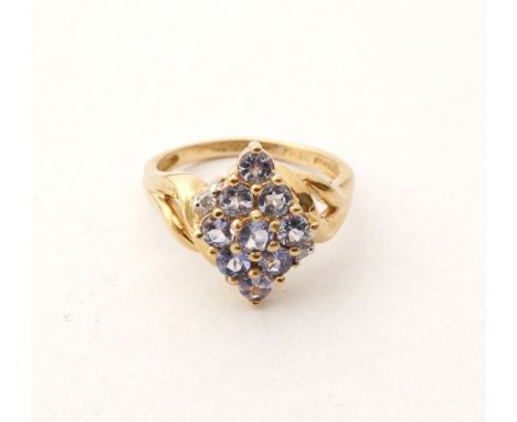 TANZANITE AND DIAMOND CLUSTER DRESS RING
on nine carat gold shank, ring size K-L