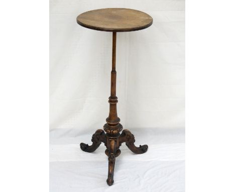 ROSEWOOD AND WALNUT TRIPOD OCCASIONAL TABLE
with a circular top on a tapering column and tripod base, 91.5cm high 