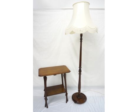 OAK STANDARD LAMP
the turned shaped column with carved decoration, standing on a circular base, 154cm high excluding shade; t