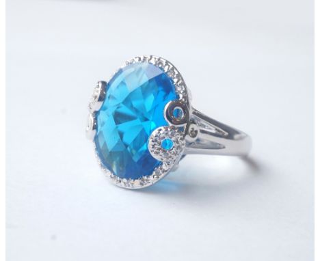 BLUE AND WHITE GEM SET DRESS RING
on silver shank, ring size R