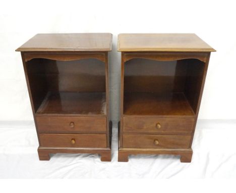 PAIR OF MAHOGANY BEDSIDE CABINETS
with open shelves above two drawers, standing on bracket feet, 43cm wide 