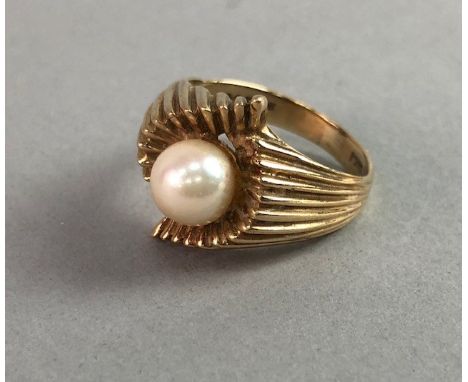 NINE CARAT GOLD PEARL RING, the spherical pearl set to a textured asymmetrical shank, size N, 5.2g