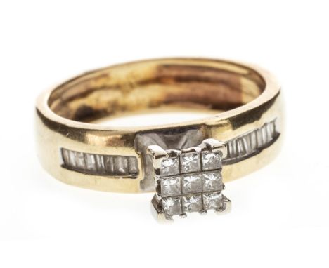 DIAMOND DRESS RING, the raised central section set with princess cut stones, the shoulders set with baguette cut stones, the 