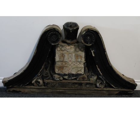 Architectural Salvage - an early 20th century oak swan neck door casing pediment, carved with the arms and motto of the City 