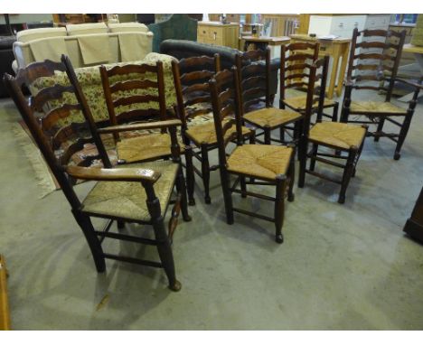Eight ladder back chairs including two armchairs