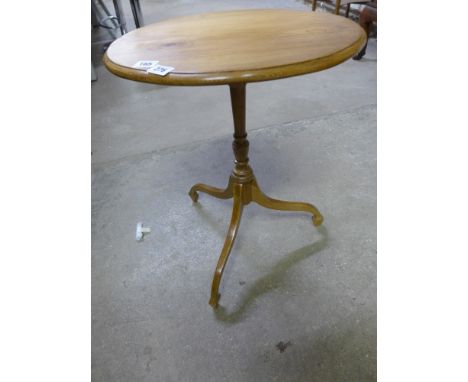 A pine oval top tripod wine table - Height 58 cm x 43 cm x 32 cm 