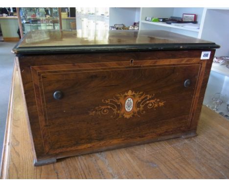 A good quality rosewood inlaid music box playing six Airs with a bellows sound box action 55cm wide x 35cm deep x 32cm tall
C