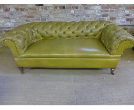 An Edwardian drop end leather button back Chesterfield - Height 68 cm x Width 1.91 m x Depth 86 cm 