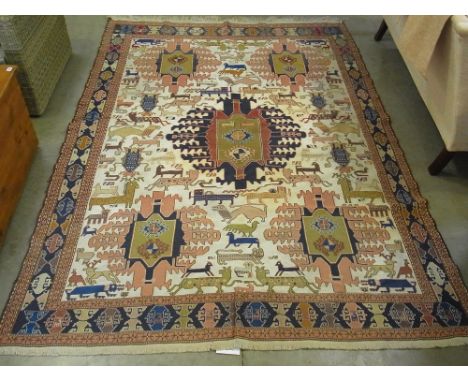 A large Kelim rug - decorated with animals on a cream field - 3.04 m x 2.08 m
Condition report: Generally good condition, som
