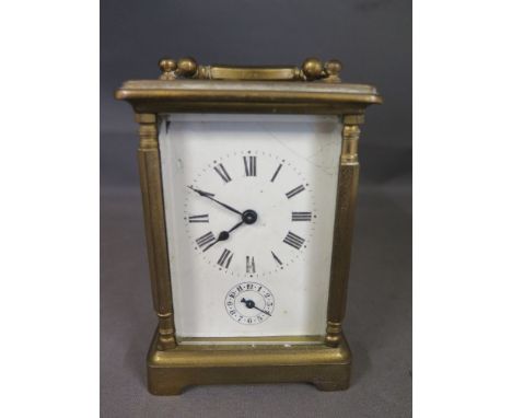 A brass timepiece Carriage alarm clock 
Condition report:  In need of restoration 