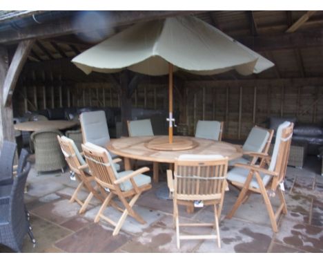 A Bramblecrest Banbury table - two Radley recliners, six Radley side chairs, a Lazy Susan 75cm - a 3 m olive green parasol, s