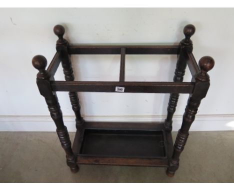 A Victorian oak stick stand - Height 79 cm x Width 61 cm x Depth 30 cm 