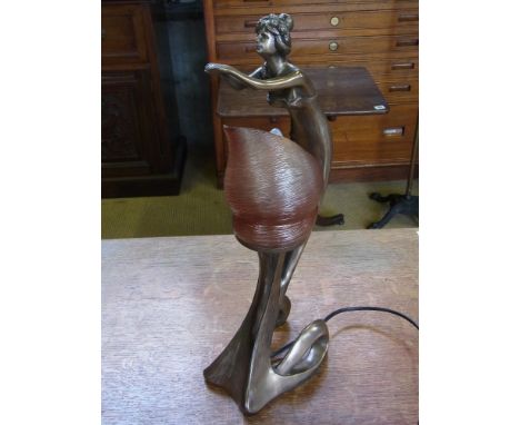 An Art Nouveau style lady table lamp
Condition report: In working order 