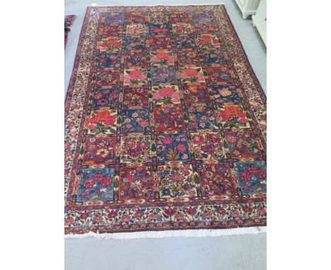 A beige ground handmade fine Persian Baktaire carpet - 2.35 m x 1.52 