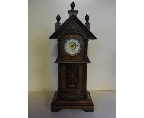 Eight small longcase clock walnut case with ceramic dial
Condition report: Working order