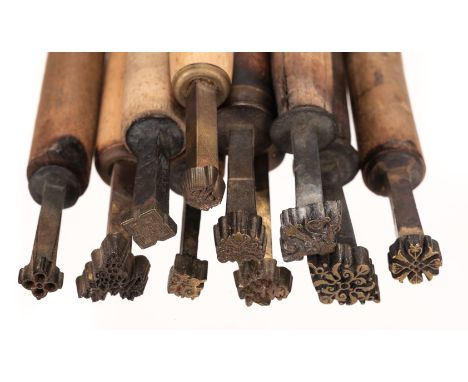 * Decorative finishing tools. 20 brass decorative finishing tools, mostly comprising centre tools, makers include Beard, Dyer