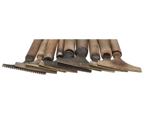 * Decorative finishing tools. 20 brass decorative finishing tools, mostly comprising centre tools, makers include Beard, Hoar