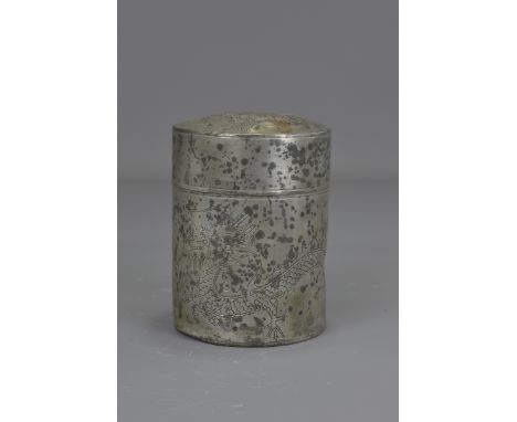 A Chinese early 20th century pewter tea caddy stamped Kut Hing Swatow. 13 cm tall.