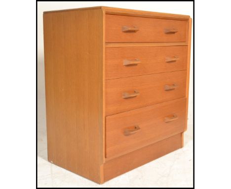 E. Gomme- G Plan- Brandon Range- A&nbsp; 20th Century light oak chest of drawers. The chest consisting of four straight drawe