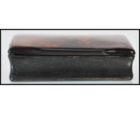 A 19th Century Georgian antique snuff pot / box of rectangular form having a panel to inlaid tortoise shell to the lid.&nbsp;