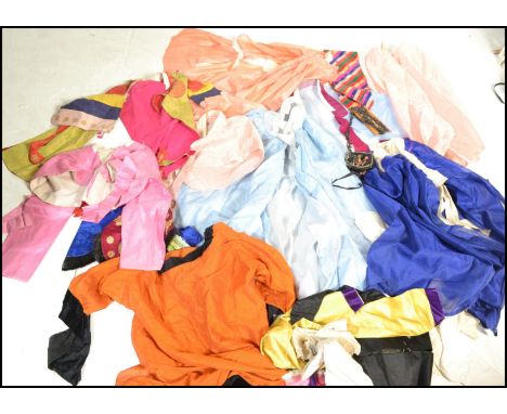 A selection of 20th Century Chinese traditional HanFu clothing to include robe jackets having cross over neck lines wide slee