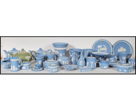 A large collection of 20th Century Wedgwood Jasperware ceramics to included lidded trinket pots, plates, vases, trinket dishe